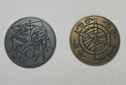 Kovové mince k označení aktivního sloupce a na sólovou hru. Průměr 39 mm. 